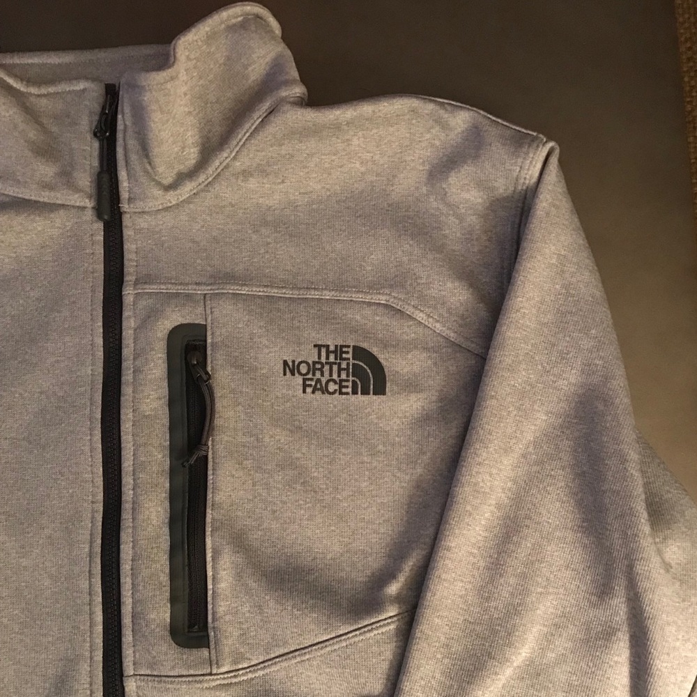 Grey and black North Face quarter zip